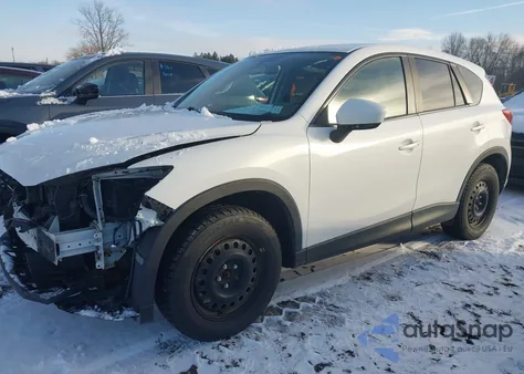 2014 Mazda Cx-5 Touring z USA, uszkodzony, nr VIN JM3KE2CY9E0350474